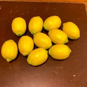 Artificial lemons. 10 faux plastic lemons.